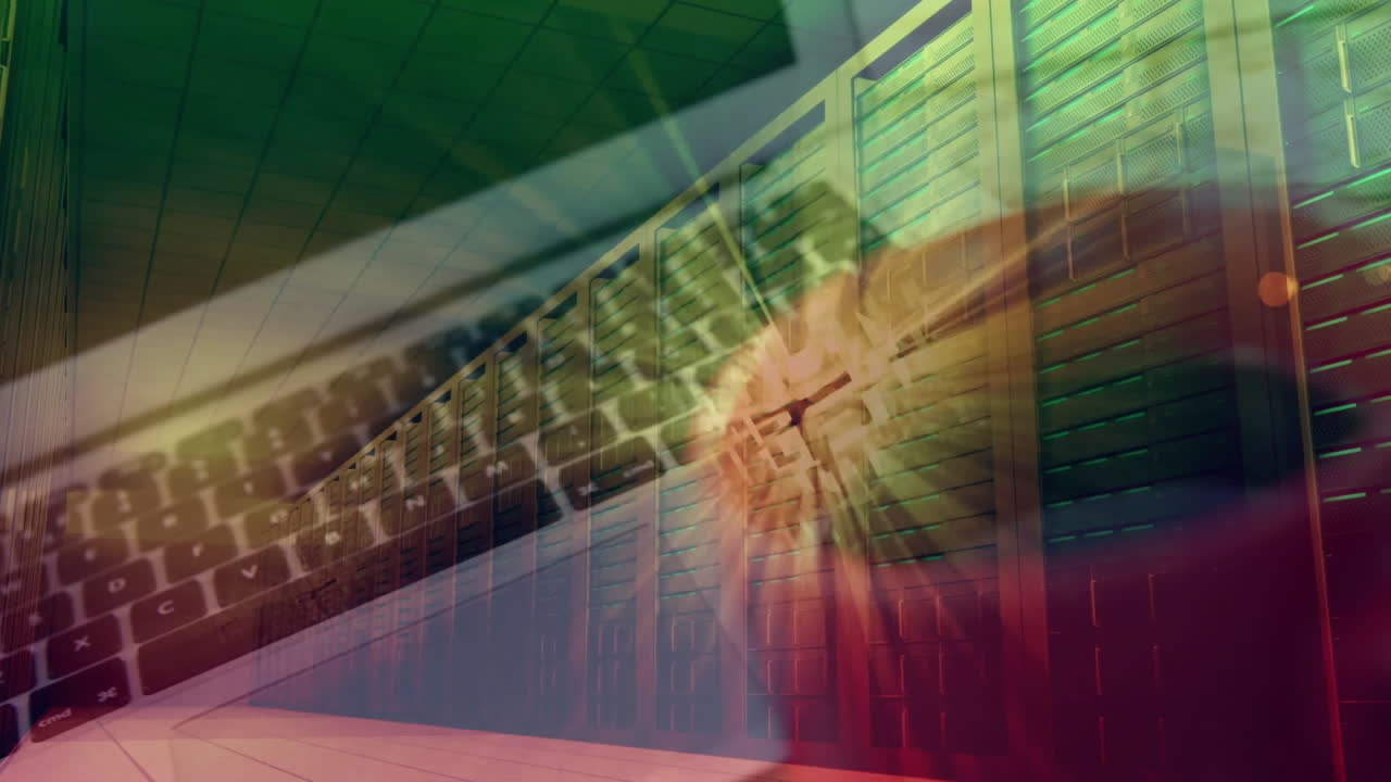 Laptop keyboard overlaying server racks, glowing with layered green red yellow lighting