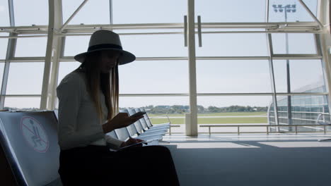 woman waiting at airport