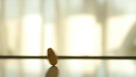 spinning coin on a table