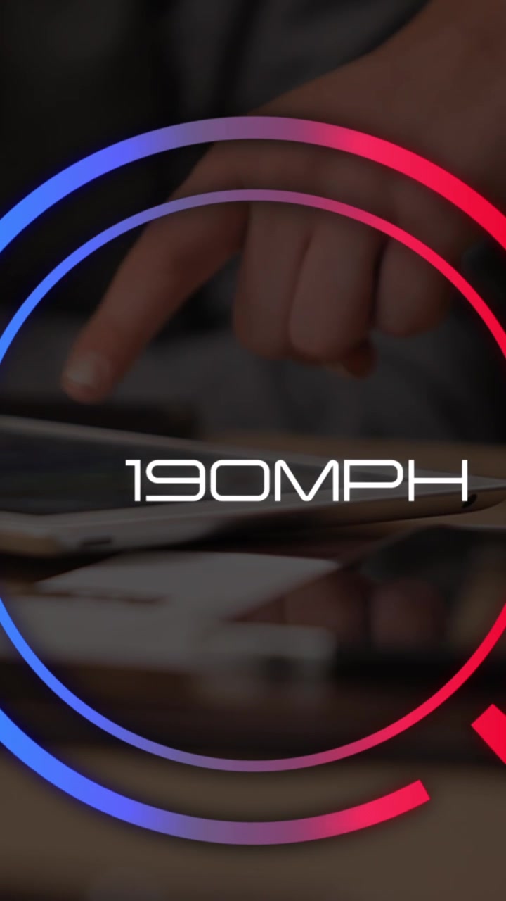 Animation of speedometer over hands of man using tablet