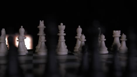 slow motion close-up of a rotating chess board, set up in the ready position waiting for a game to begin