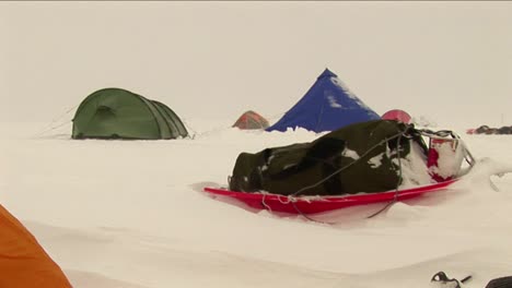 camp in a blowing snow