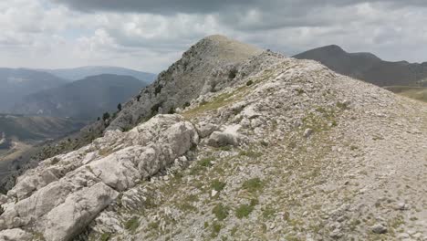 aerial view following the cliff of the mountain to see the end of the mountain range in la cerdanya