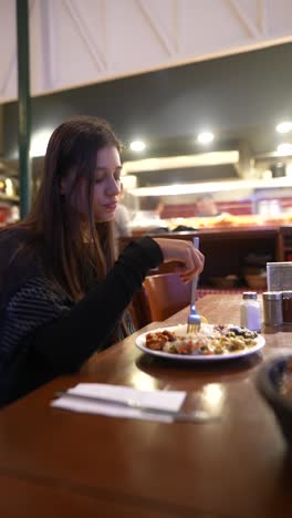 woman eating in a turkish restaurant