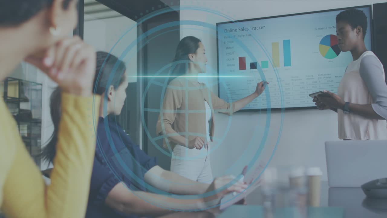 Presenter speaking and pointing, HUD appearing over sales charts and tablet, showing cyber security