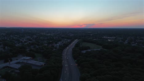 aerial view of highway traffic at sunset