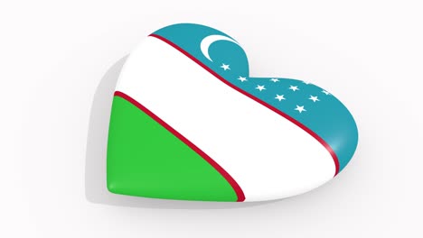 corazón con los colores y símbolos de uzbekistán sobre fondo blanco, bucle