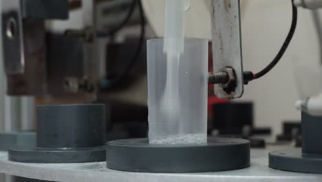 machine in insemination center collecting semen in flasks