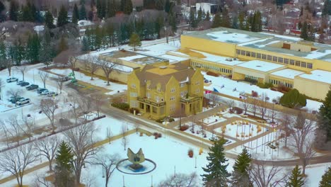 aerial winter semi circle around the government house in the foreground and in the background the old royal alberta museum designated by her majesty queen elizabeth ii on may 24th 2005 centennial 4-6