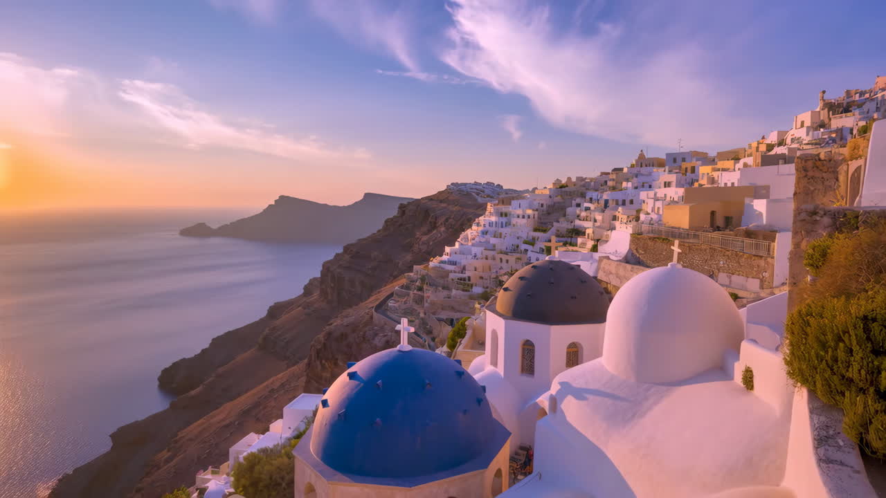 Vibrant Sunset over Oia Village and Blue Domes in Santorini, Greece