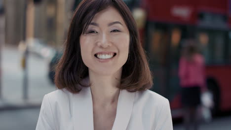 slow motion portrait of beautiful japanese businesswoman smiling