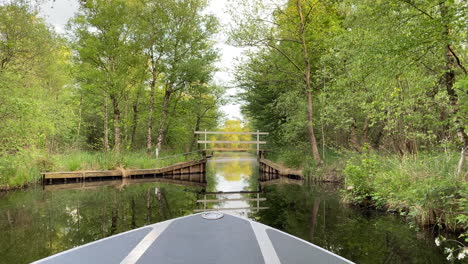 Bow-Of-A-Sailing-Boat-In-The-River-Of-Ossenzijl-Village-In-Overijssel,-Netherlands