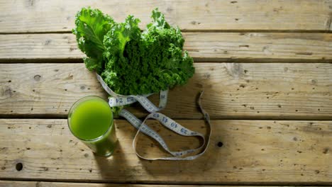 green tea with leafy vegetable and measuring tape 4k