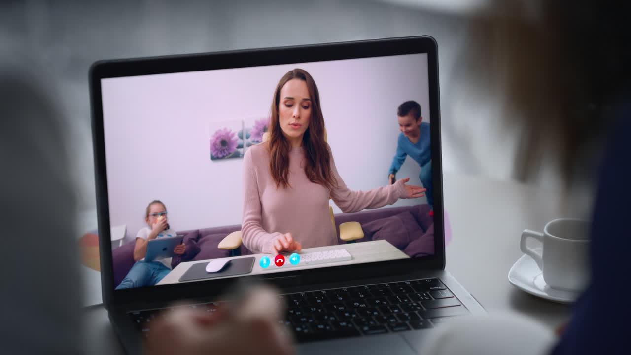 Family talking video meeting by laptop close up. Couple greeting mother children