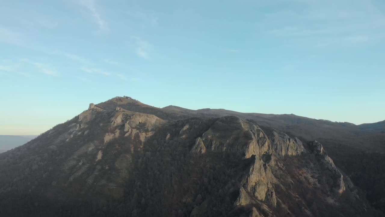 Aerial shot of mountain hill with forest and cliffs-7