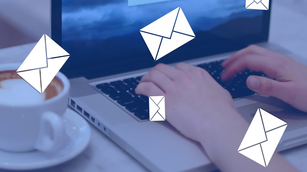 Hands typing on a laptop beside a coffee 4k