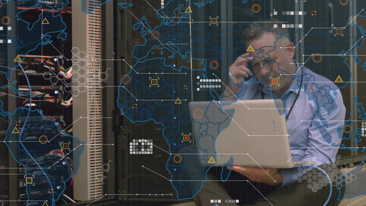 Animation of world map over caucasian businessman in server room