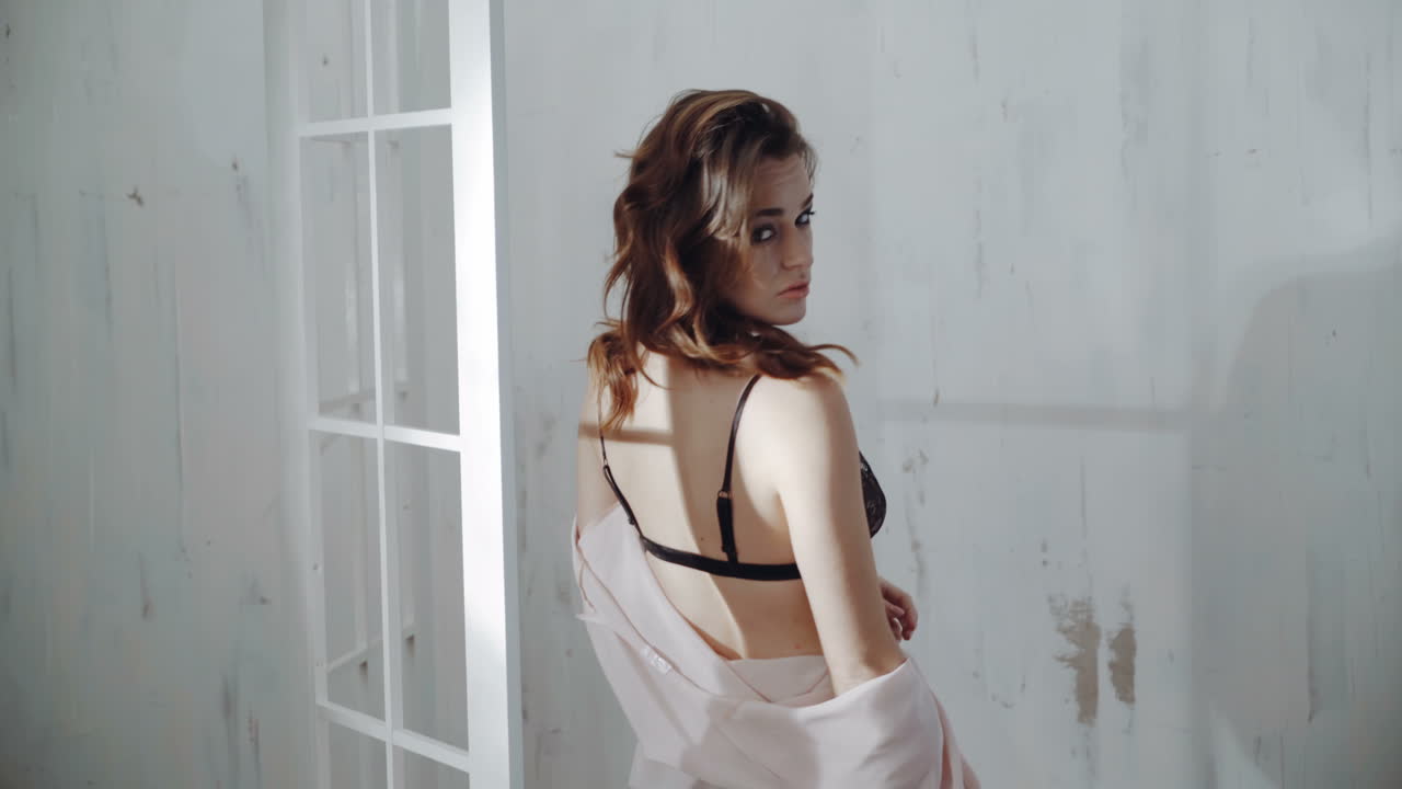 Woman in Pink Robe and Lingerie