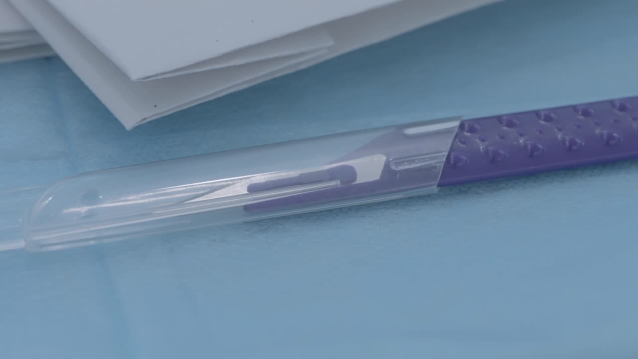 Surgical Scalpel in Protective Cover