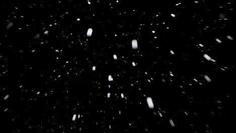 bolas blancas cayendo sobre un fondo negro. abstracción.