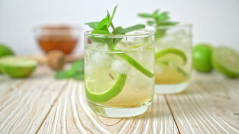 iced honey and lime soda with mint - refreshing drink