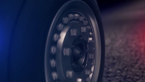 close-up of a car wheel at night