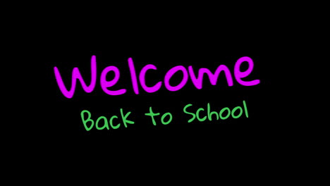 welcome back to school handwritten on black background