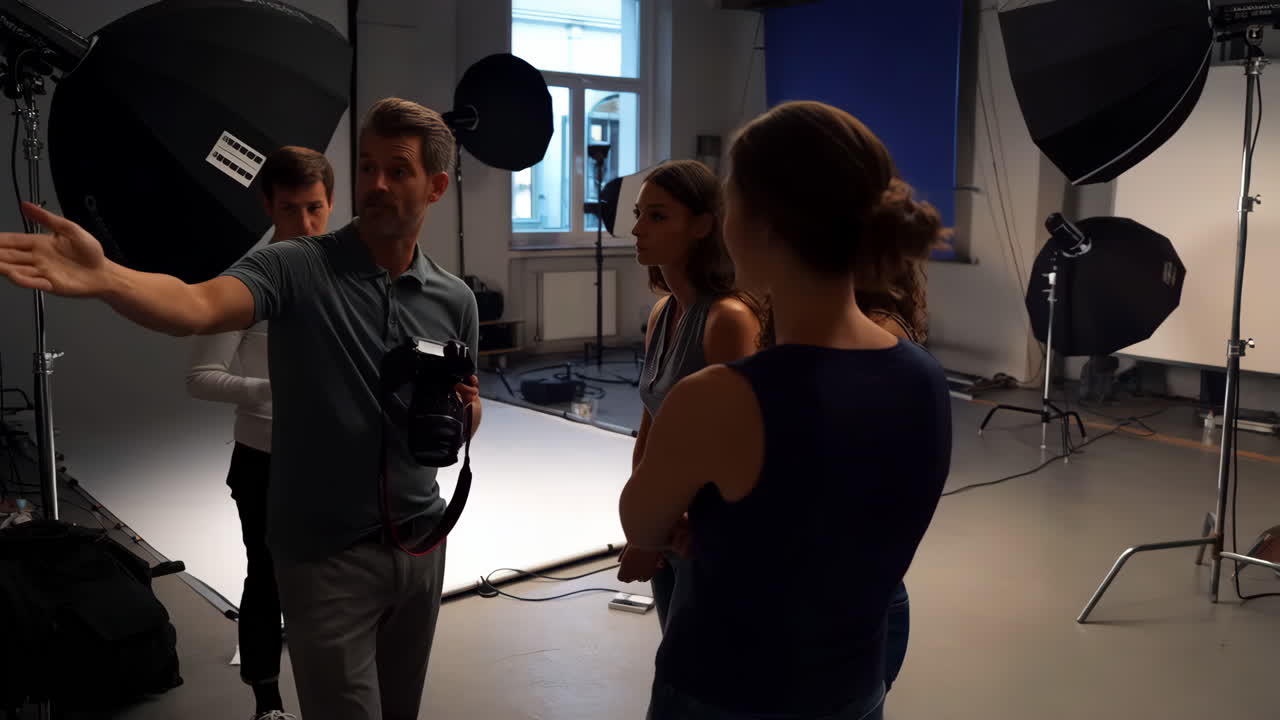 Photographer and models during a studio photoshoot
