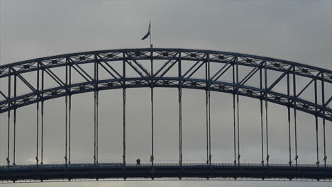 Train-moves-across-Sydney-Harbour-Bridge-during-the-early-morning,-Australia