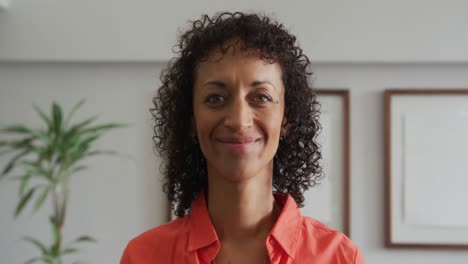 Close-up-of-African-american-woman-looking-at-camera-in-the-lobby-at-hospital-4k