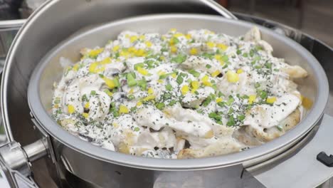 Big-bowl-of-chicken-in-white-sauce-at-buffet-restaurant