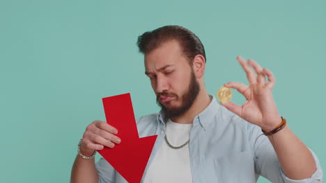 upset man showing red arrow pointing down, fall of cryptocurrency stock market, mining bitcoins btc