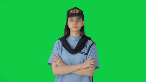 Portrait-of-Indian-female-security-guard-Green-screen