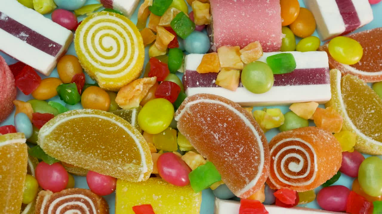 frutas confitadas mermelada de naranja y limón, malvavisco de vainilla, caramelos multicolores mixtos giran. dulces para niños