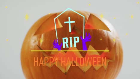 Animation-of-happy-halloween-text-over-tombstone-and-carved-pumpkin