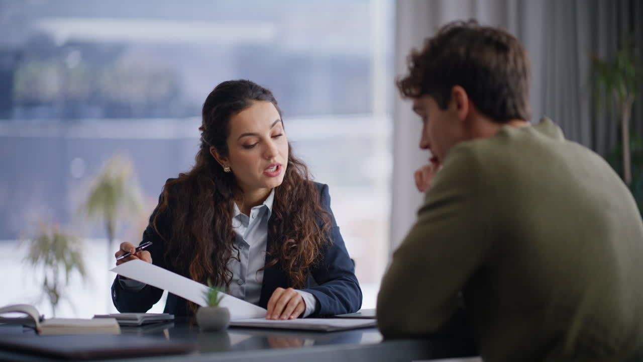 Professional consultant talking client discussing at panoramic office closeup