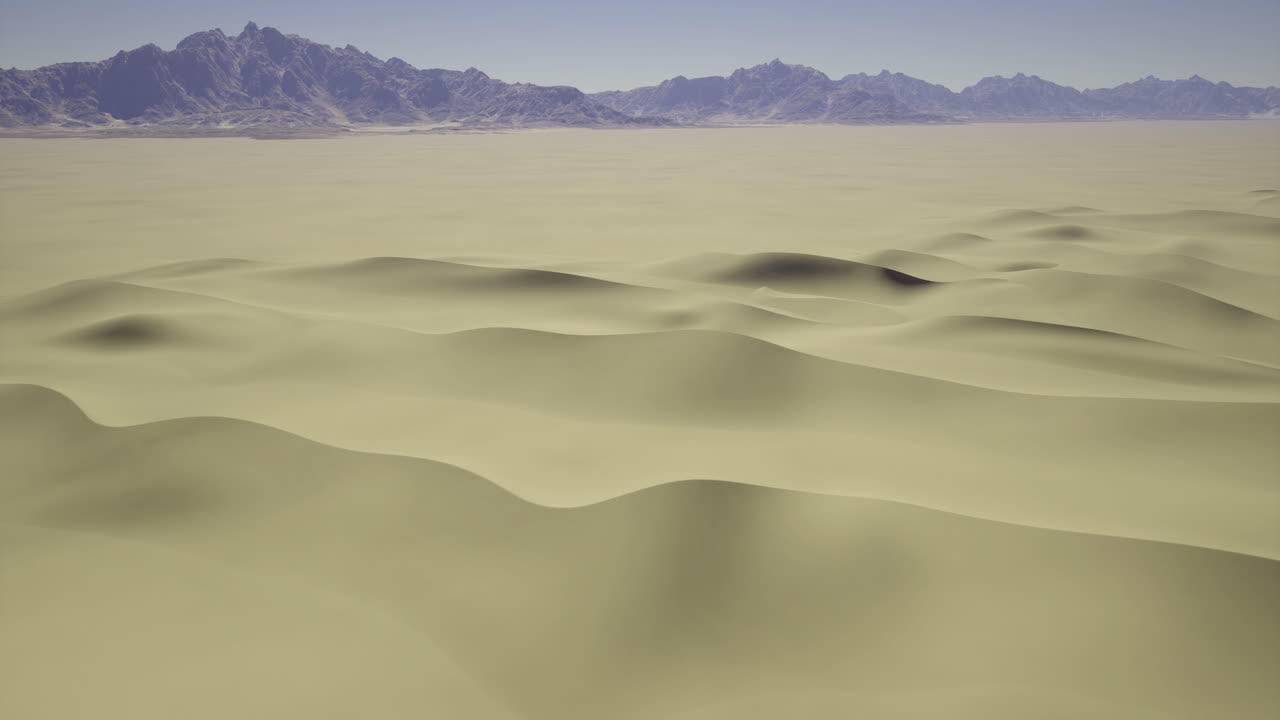 Expansive desert landscape with gentle sand dunes and distant mountains