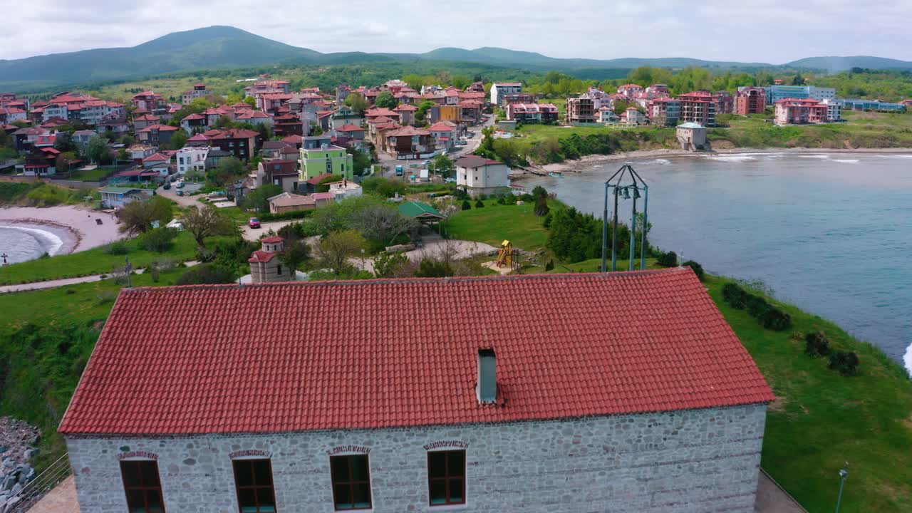 Reveal of Church of the Мiraculous success in Tsarevo with strong waves hitting the coast