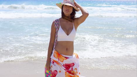 Sexy-young-woman-posing-on-a-tropical-beach