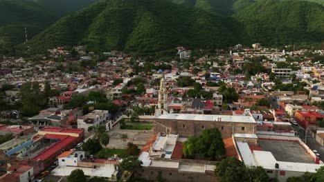 our lady of the rosary church in ajijic city center, jalisco, mexico - backward drone reveals cityscape