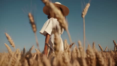 woman in white dress in wheat field
