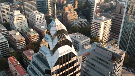 aerial drone shot passing next to art deco building in santiago chile