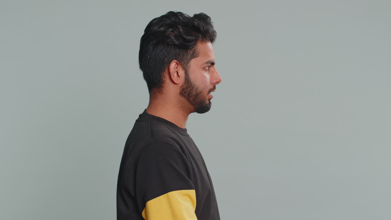 Indian man presenting birthday gift box offer wrapped present career bonus celebrating party sale