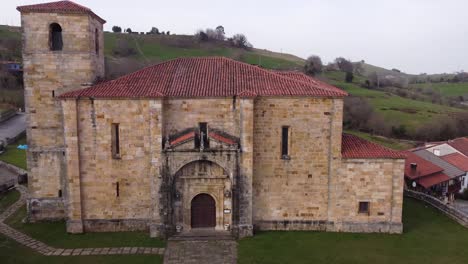 old church on cloudy day in green valley