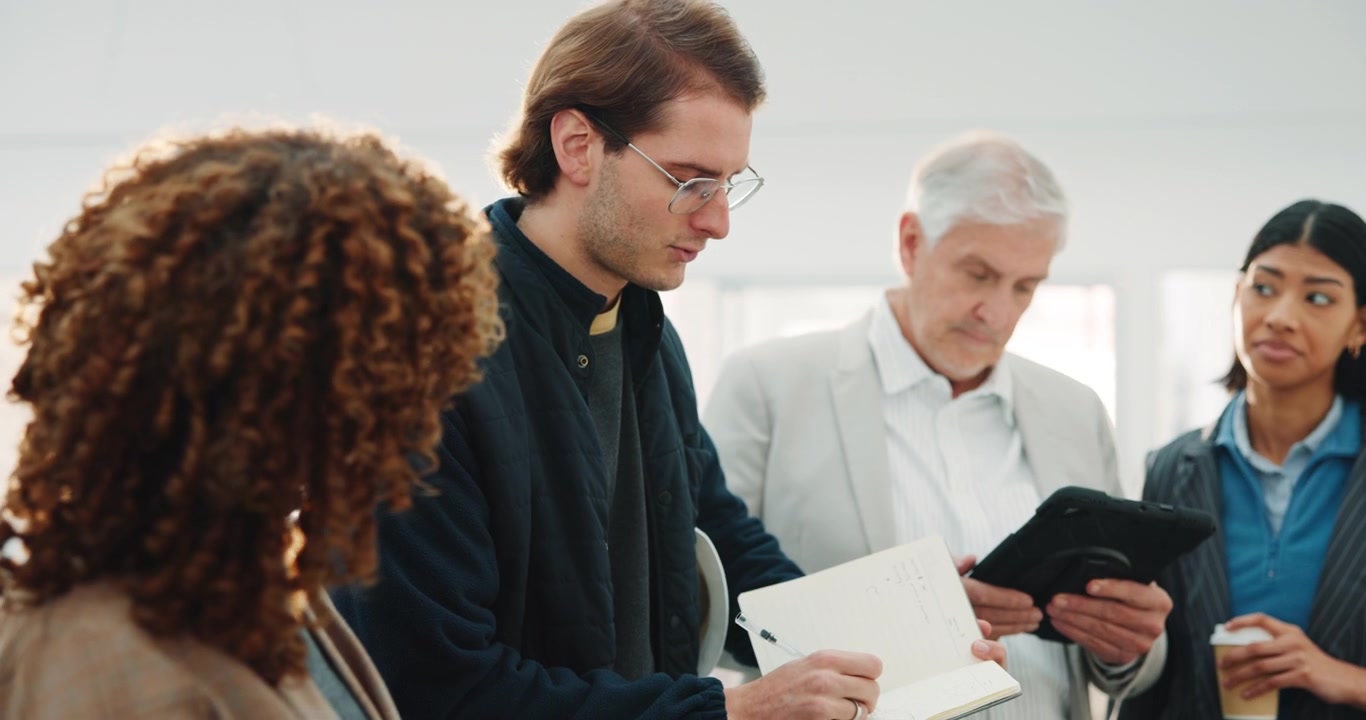 Diverse Business Team Collaborating in Modern Office Meeting