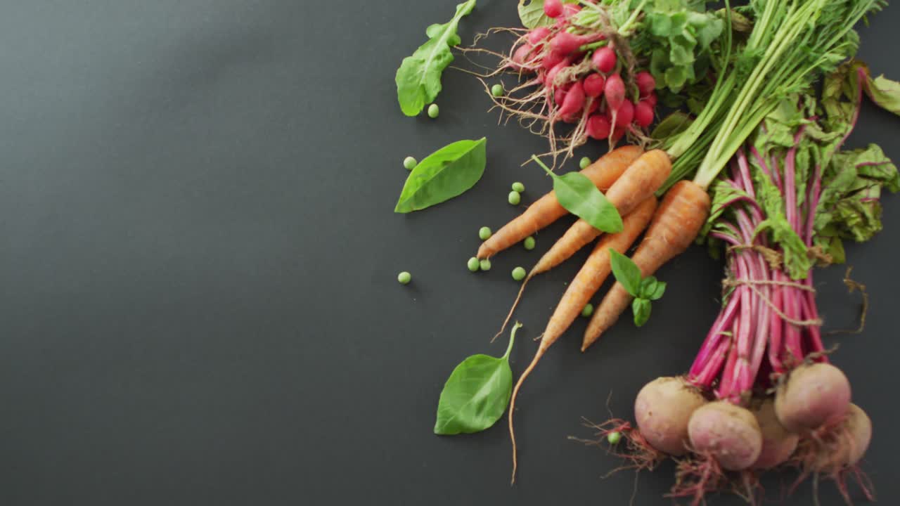 Video of fresh vegetables with copy space over grey background