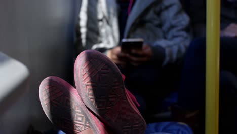 Girl-using-mobile-while-travelling-in-bus-4k