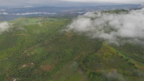 lateral movement with drone with view of mountains at a foggy morning in colombia