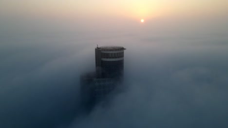 tower emerging from the mist
