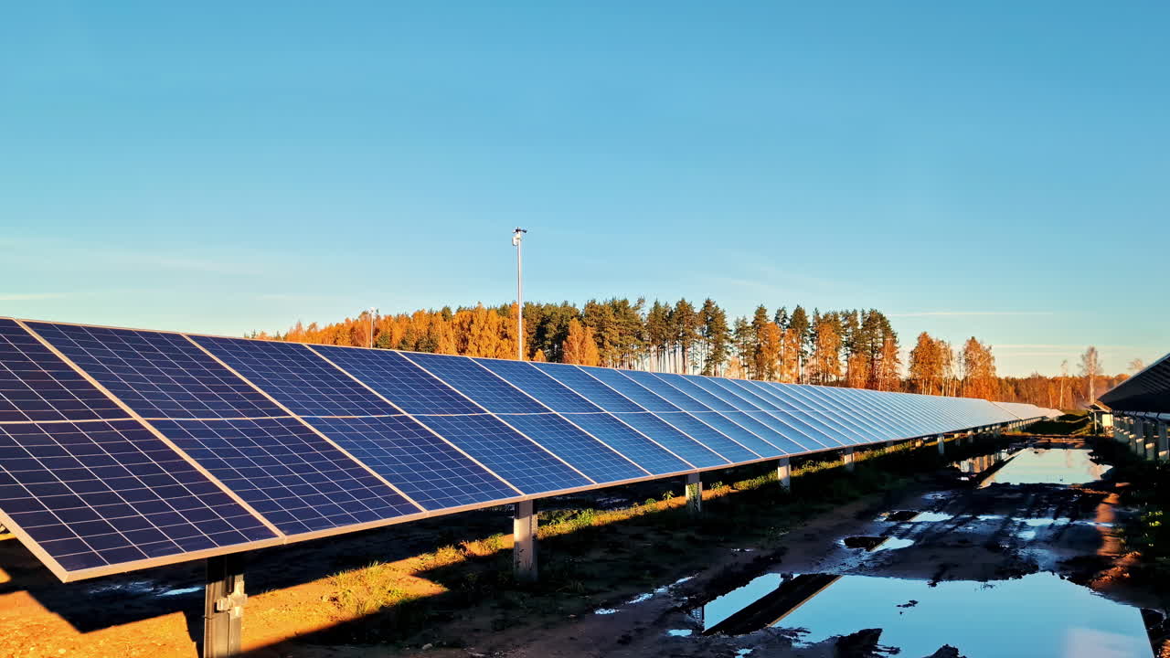 Solar panel farm photovoltaic array view from ground up-close in Riga Latvia